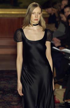 Model Carmen Kass walks on the runway during the Olivier Theyskens