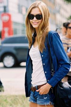 Josephine Skriver looks fab in a white corset top and denim overalls while  heading out during