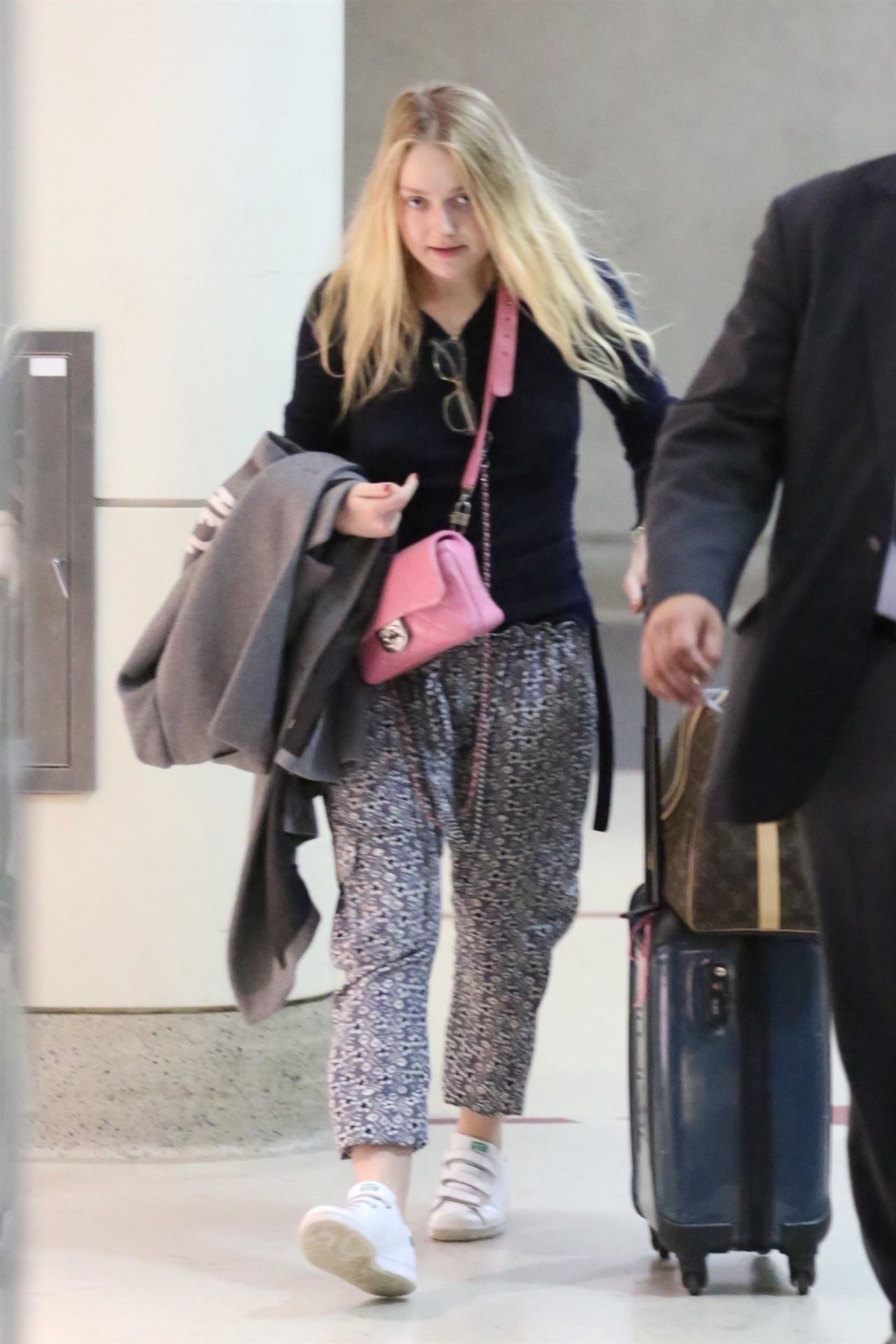 dakota-fanning-at-lax-airport-12-19-2017-2.jpg