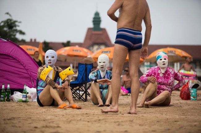 Beach Essentials in China : Flip-Flops, a Towel and a Ski Mask