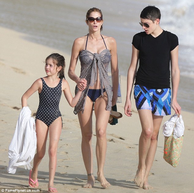 Stephanie Seymour Has A Nip-Slip In A Sexy Swimsuit On The Beach