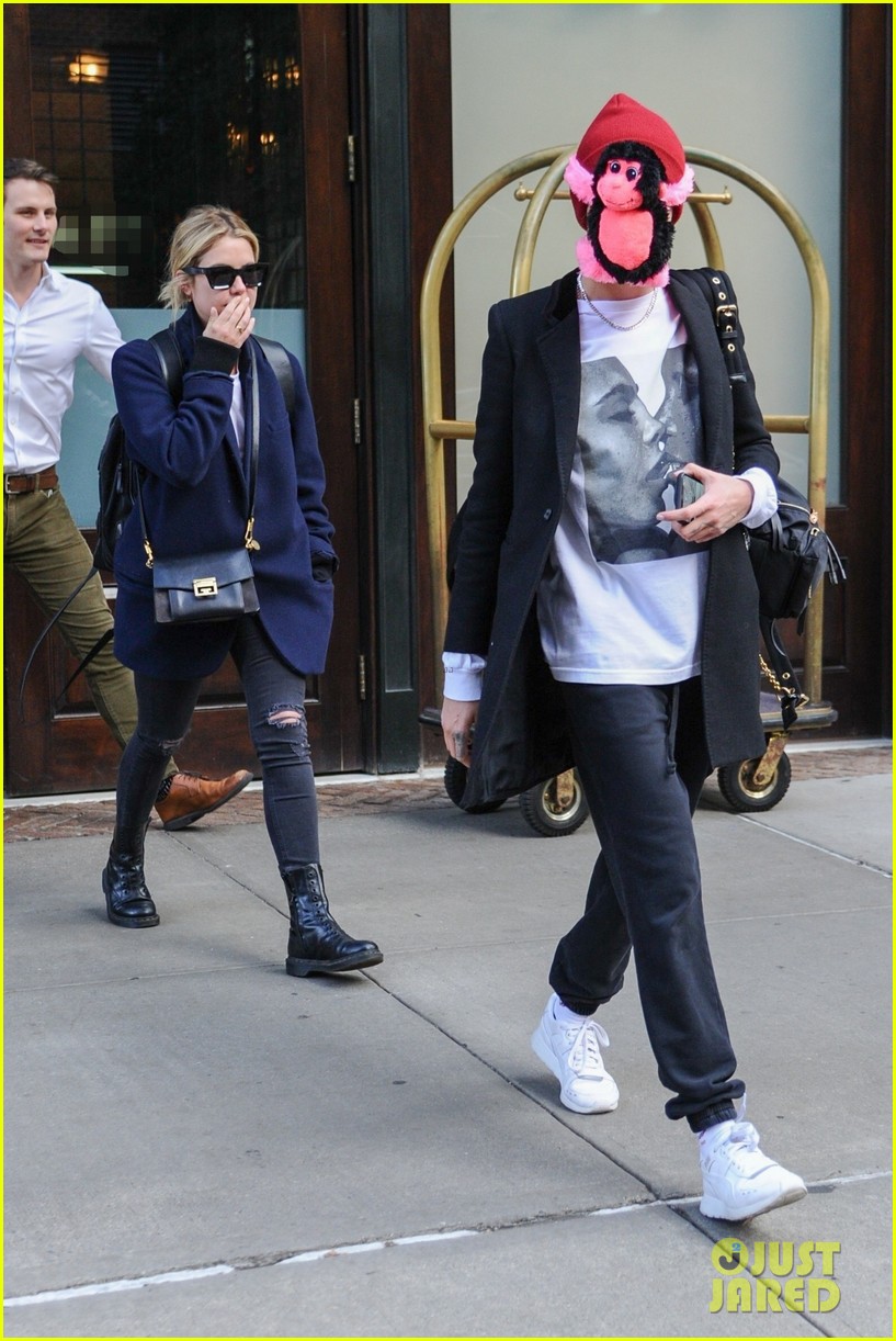 cara-delevingne-makes-ashley-benson-laugh-while-stepping-out-with-stuffed-monkey-on-her-face04.jpg