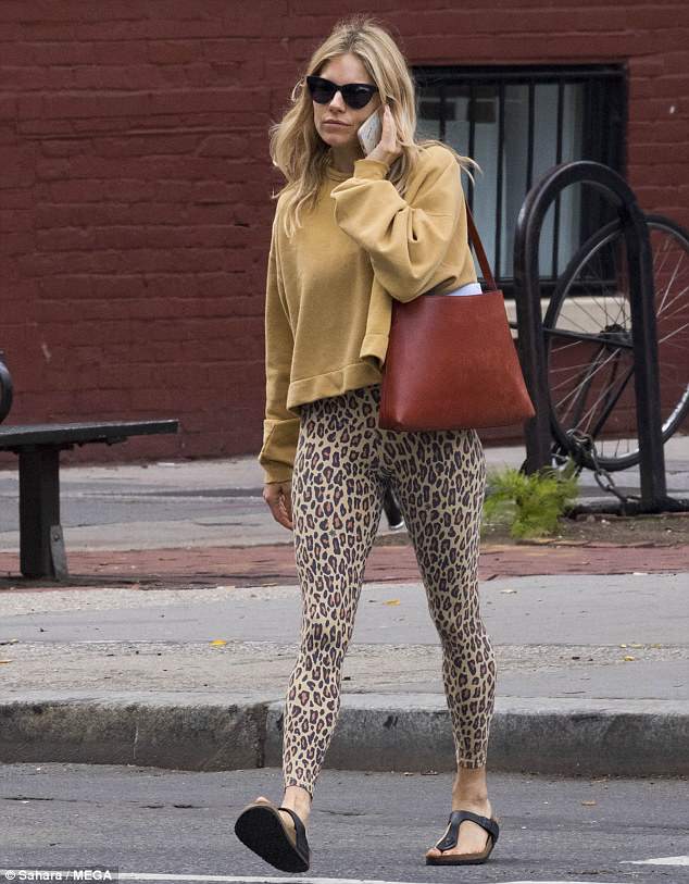 4D22A50600000578-5831341-Taking_her_time_Sienna_Miller_36_nailed_casual_chic_in_a_mustard-m-34_1528735117890.jpg