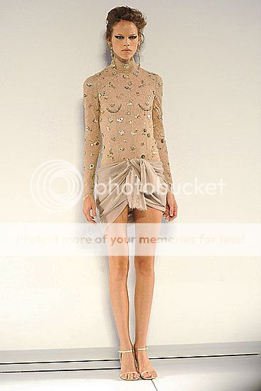 Karl-Lagerfeld-Fall-2009-Chanel-Couture-All-HighLow-Skirts-Perfume-Bottles_zpsbd69eaf8.jpg