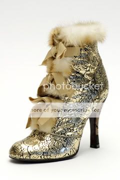 Vuitton_Embossed_Metallic_Leather_Fur-Lined_Boot_with_Bow_Ties.jpg